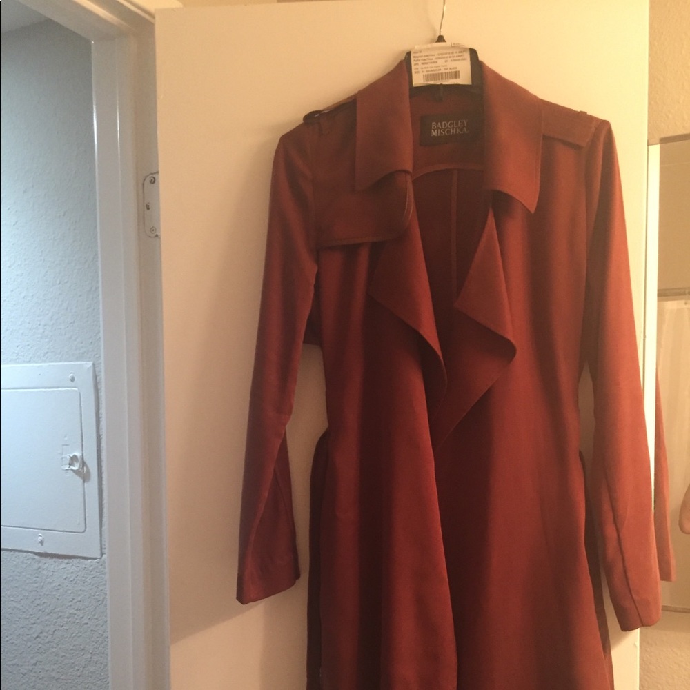 Maroon double breasted, belted trench coat